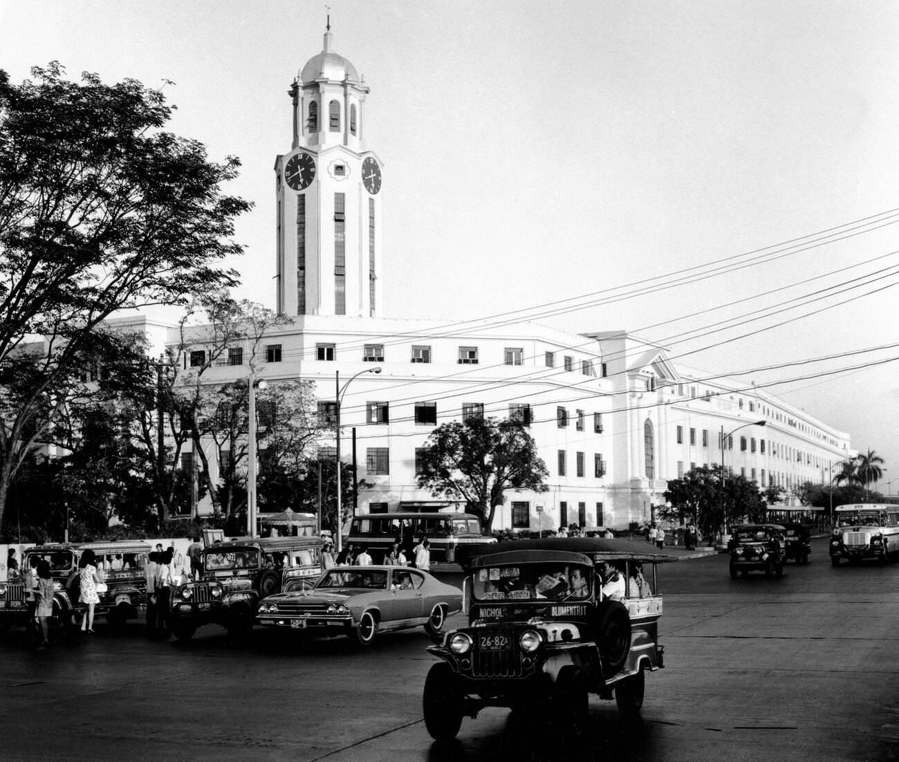 Manila's city hall on Luzon, Philippines, with jeepneys on Taft Boulevard in the foreground, 1972.
