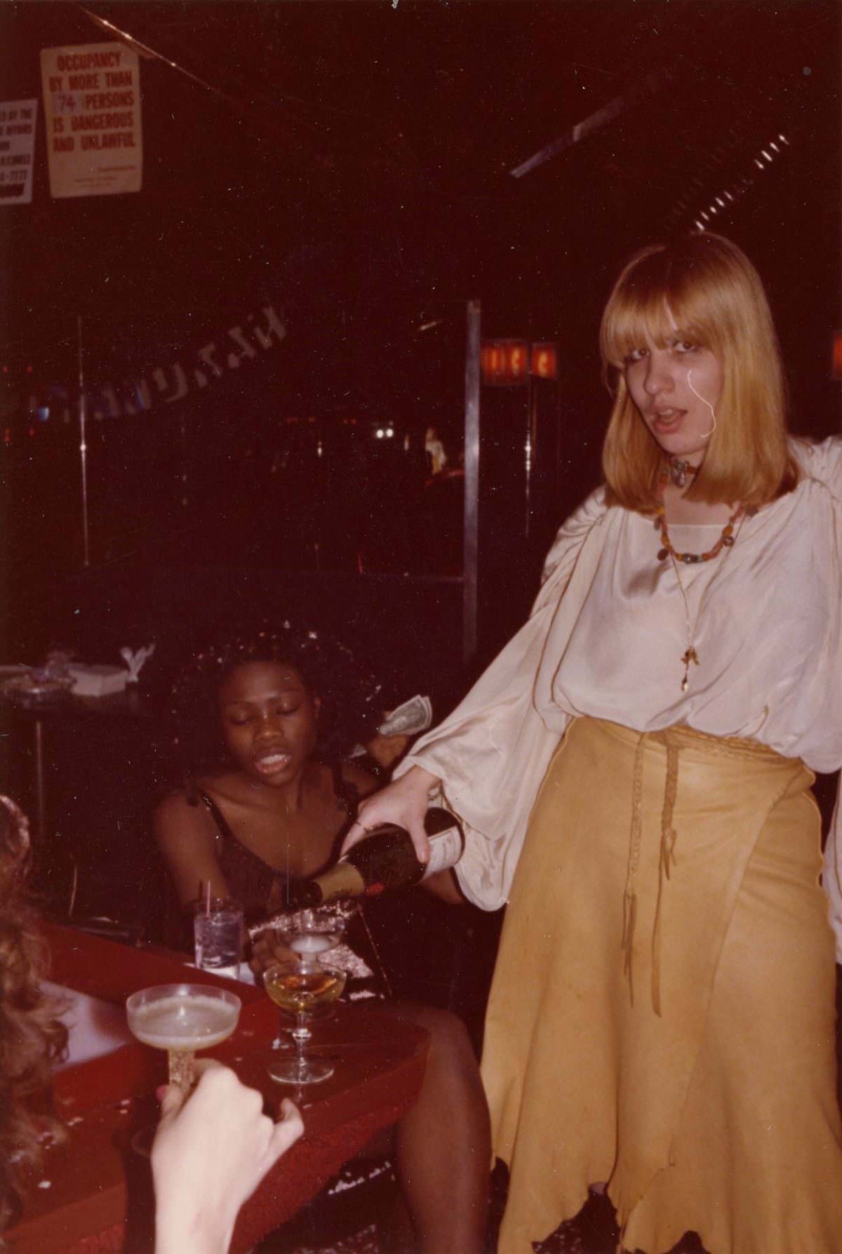 A Peek Behind the Curtain: NYC's Go-Go Bars in the 70s through the Lens of Meryl Meisler