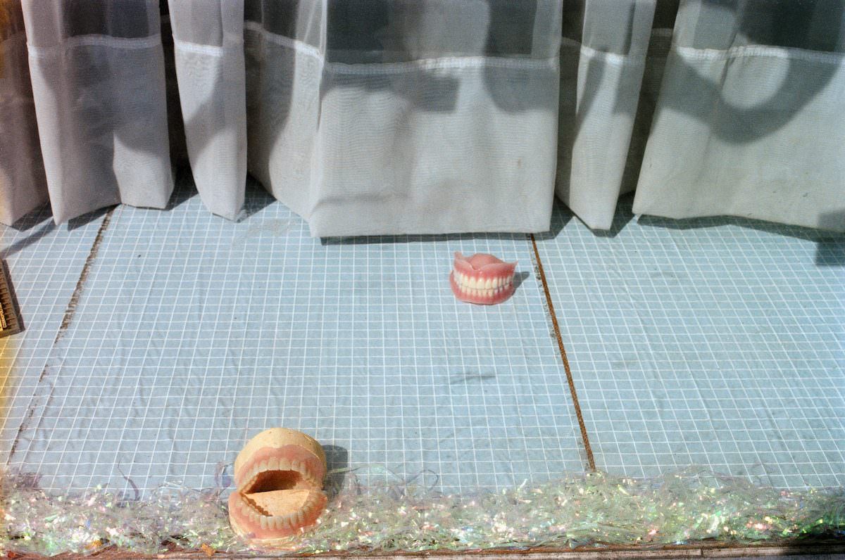 Dentist’s window in Tooting, south London, 1990