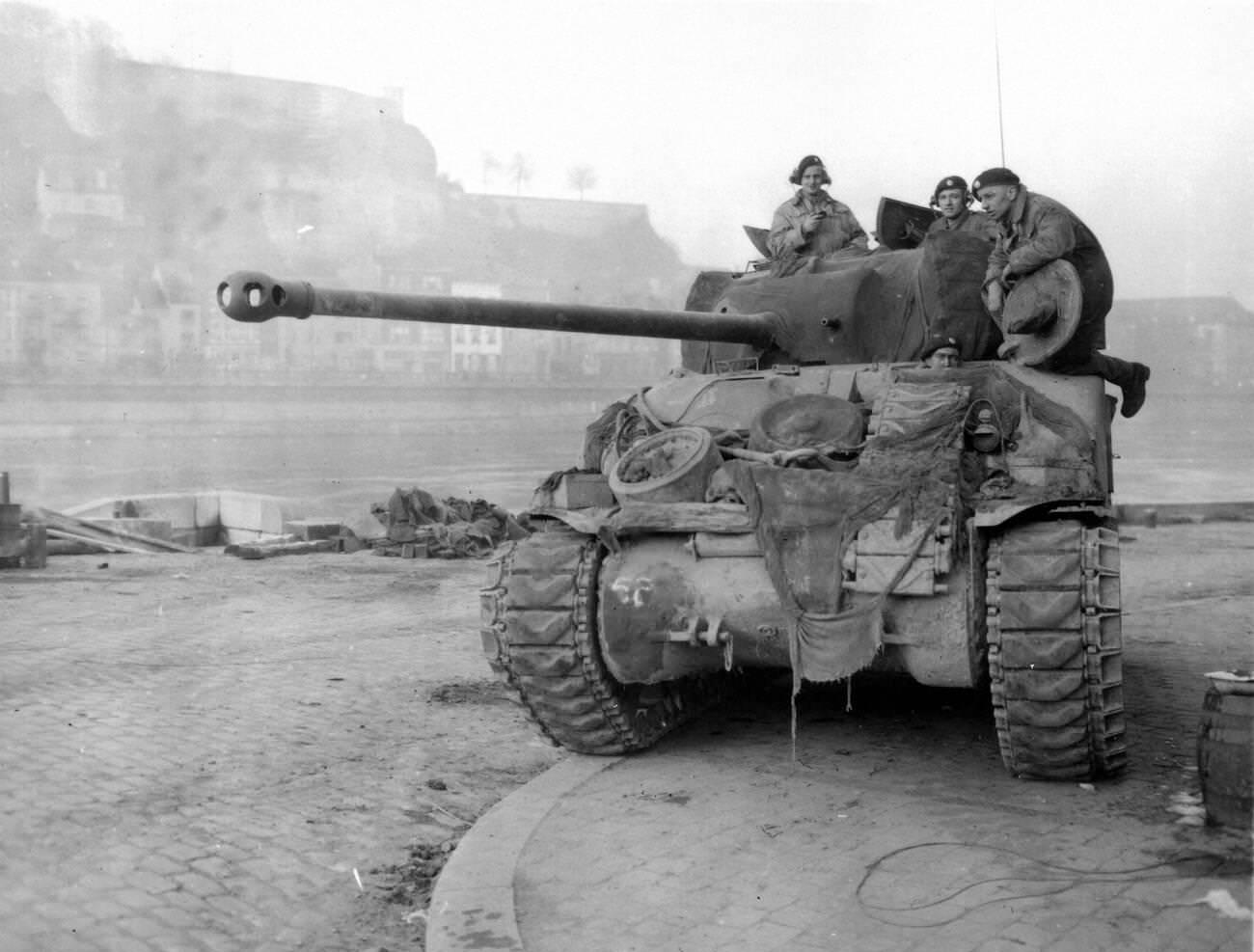 British Sherman Tank known as the Firefly patrolling the Meuse at Namur, 1944.