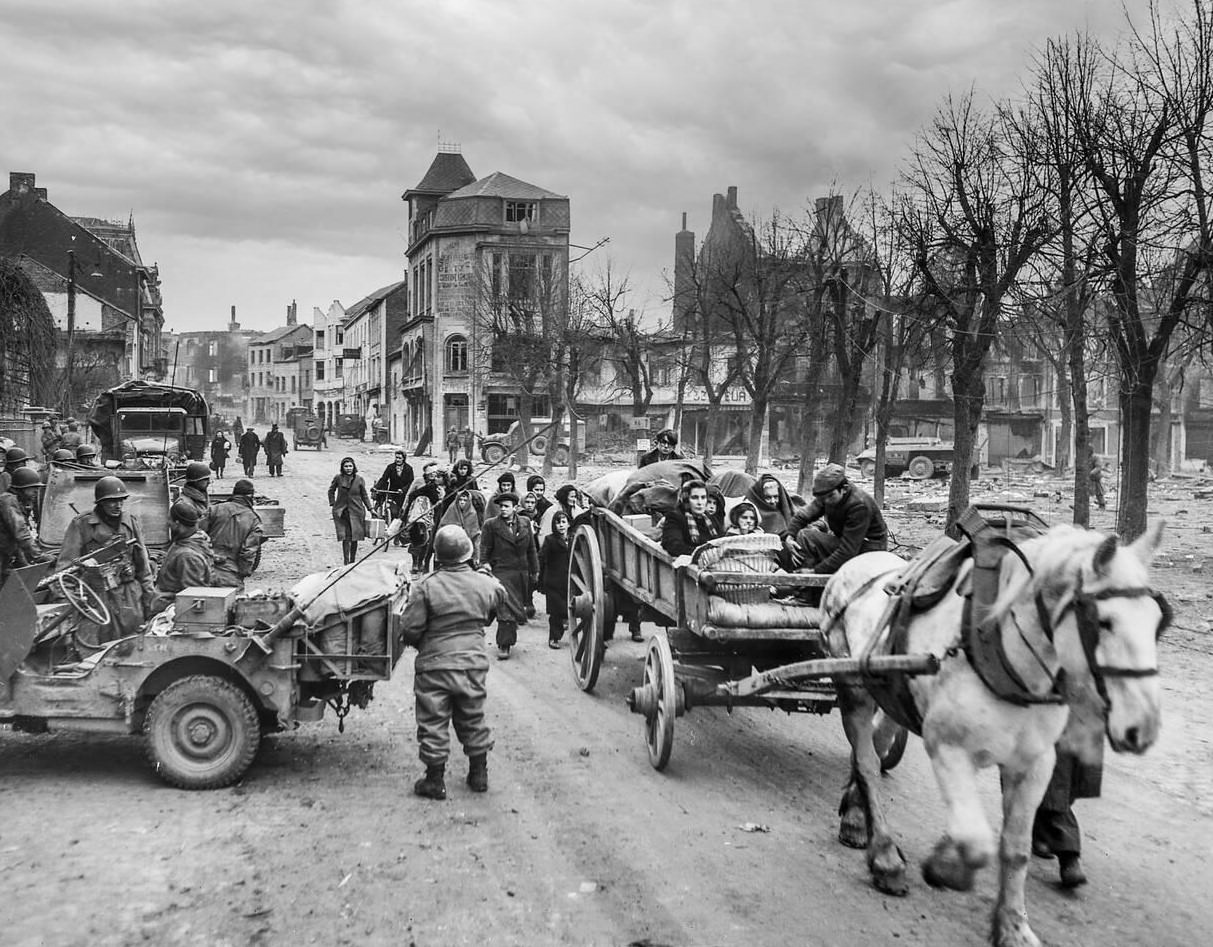 Refugees evacuating the Belgian town of Bastogne, 1944.