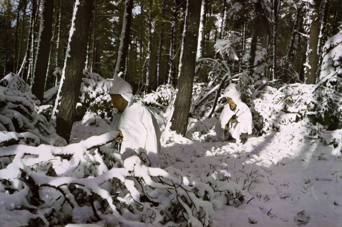 Infantrymen wearing snow capes, 1945.