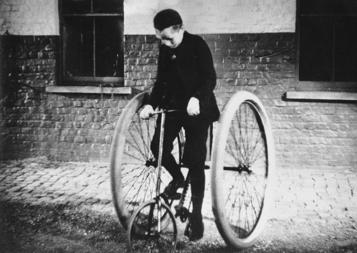A tricycle with inflated rubber tires built by John Boyd Dunlop, 1888.