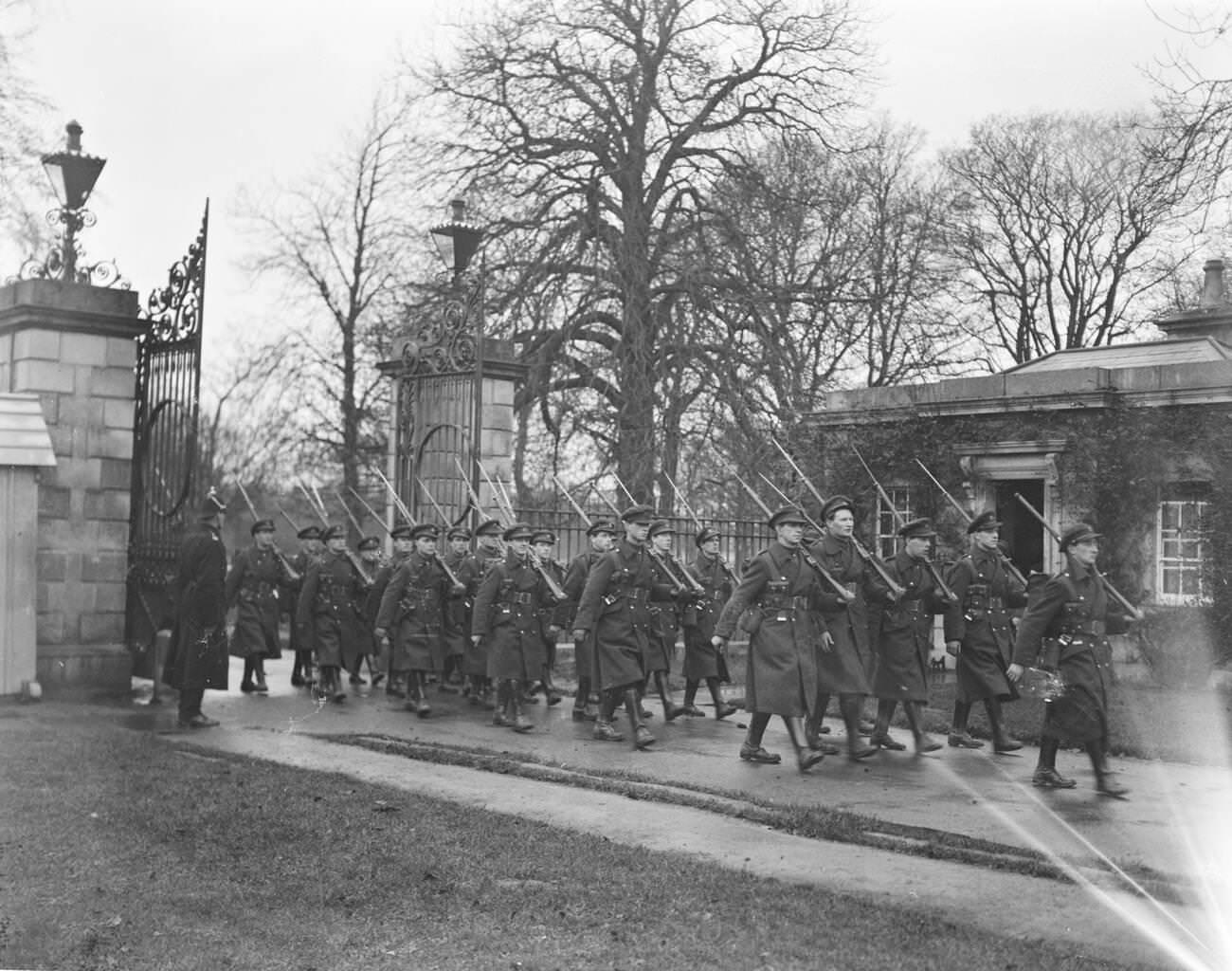 Dublin's farewell to British troops with Free State troops entering the gates of the Vice Regal Lodge, 1922.