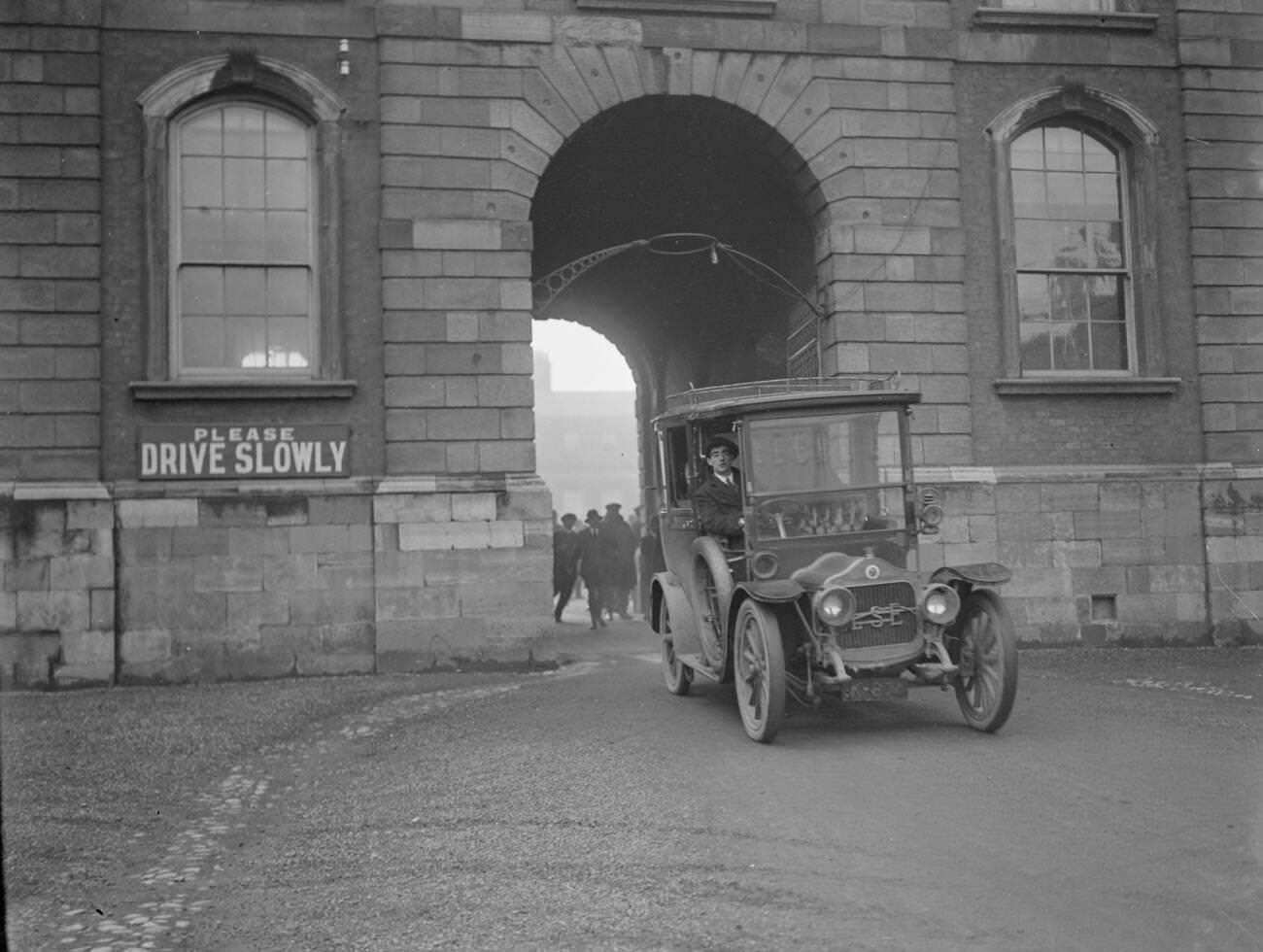 The Provisional Government of Southern Ireland takes over control of Dublin Castle with the car containing Mr Michael Collins passing through the arch, 1922.