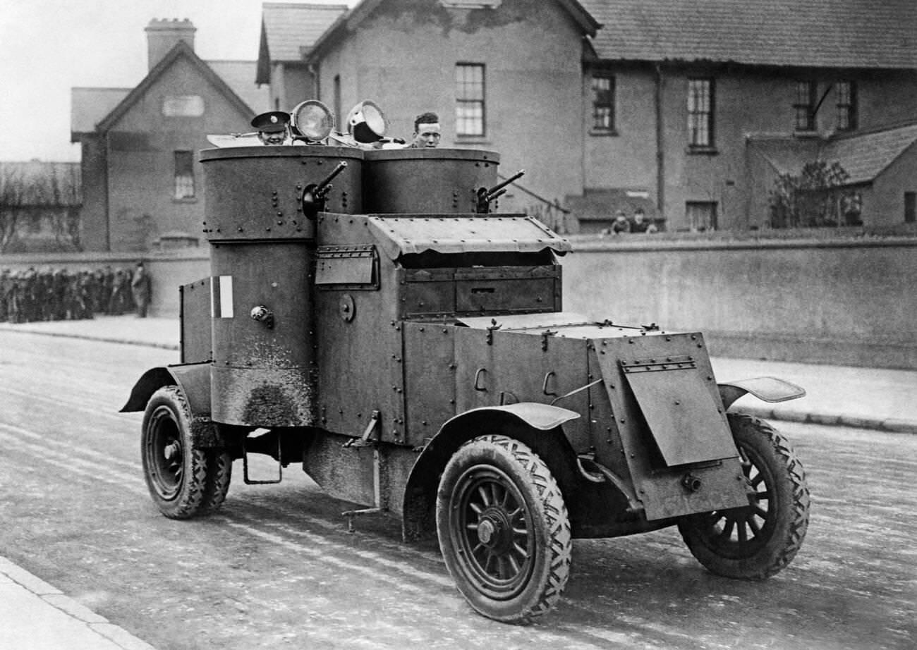 British armored cars provide reinforcements to the troops guarding the 104 Sinn Fein prisoners who are on a hunger strike in Dublin Prison, 1920.