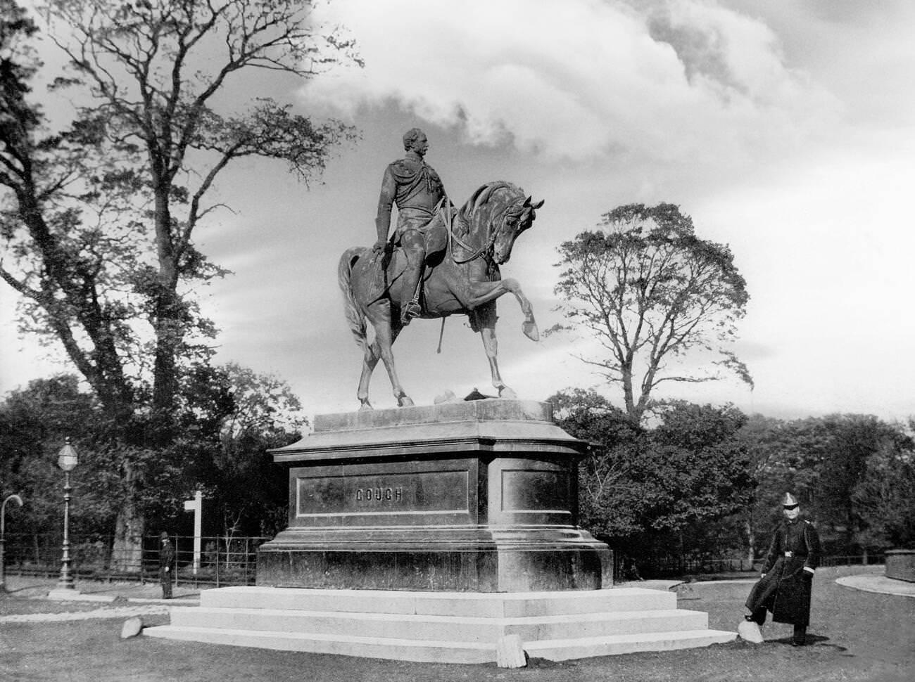 An RIC policeman next to the Gough Statue, by the sculpture J.H.Foley, in the Phoenix Park in Dublin