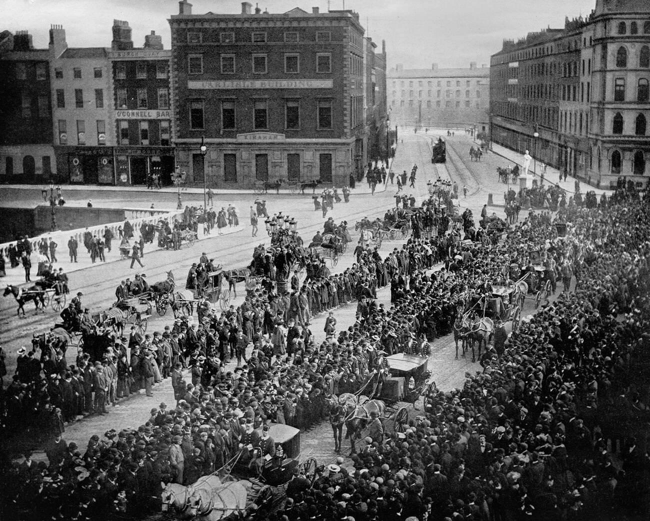 The Parnell Memorial Procession as it crosses the O'Connell Bridge over the River Liffey in Dublin