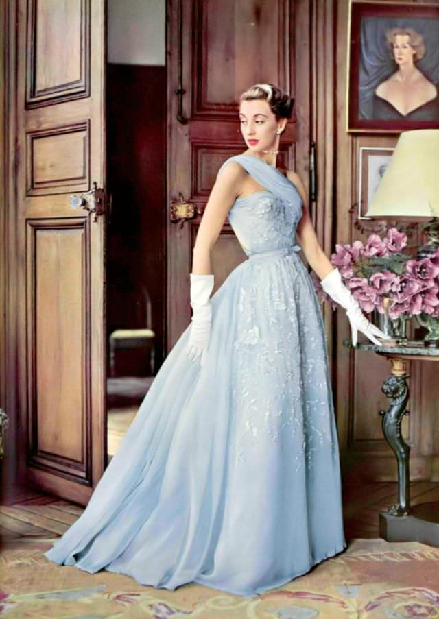 Marie-Thérèse in an evening gown of pale blue embroidered chiffon by Pierre Balmain, 1952.