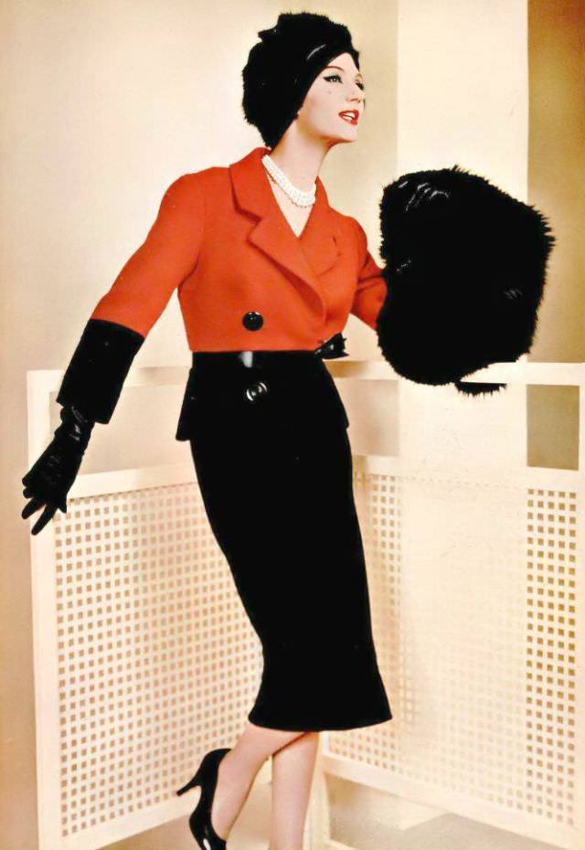 Simone d'Aillencourt in a striking red and black wool suit by Pierre Balmain, 1958.
