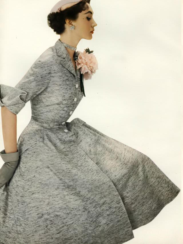 Dovima in a redingote of Celanese acetate and silk by Pierre Balmain, 1953.