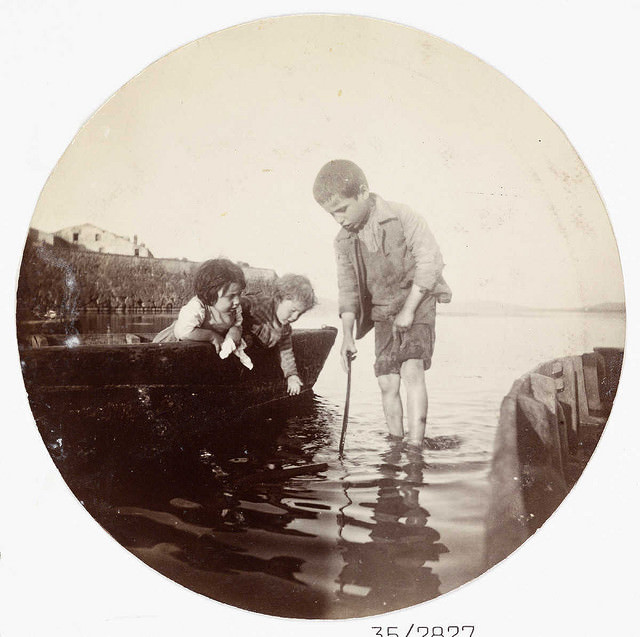 Boy paddling in the sea