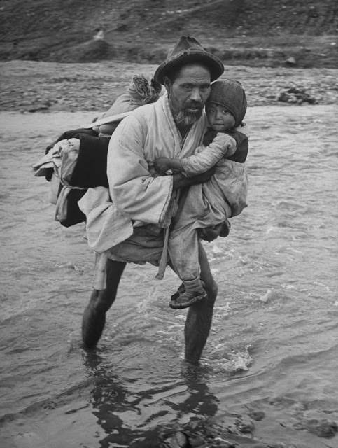 Refugees cross into South Korea, 1951.