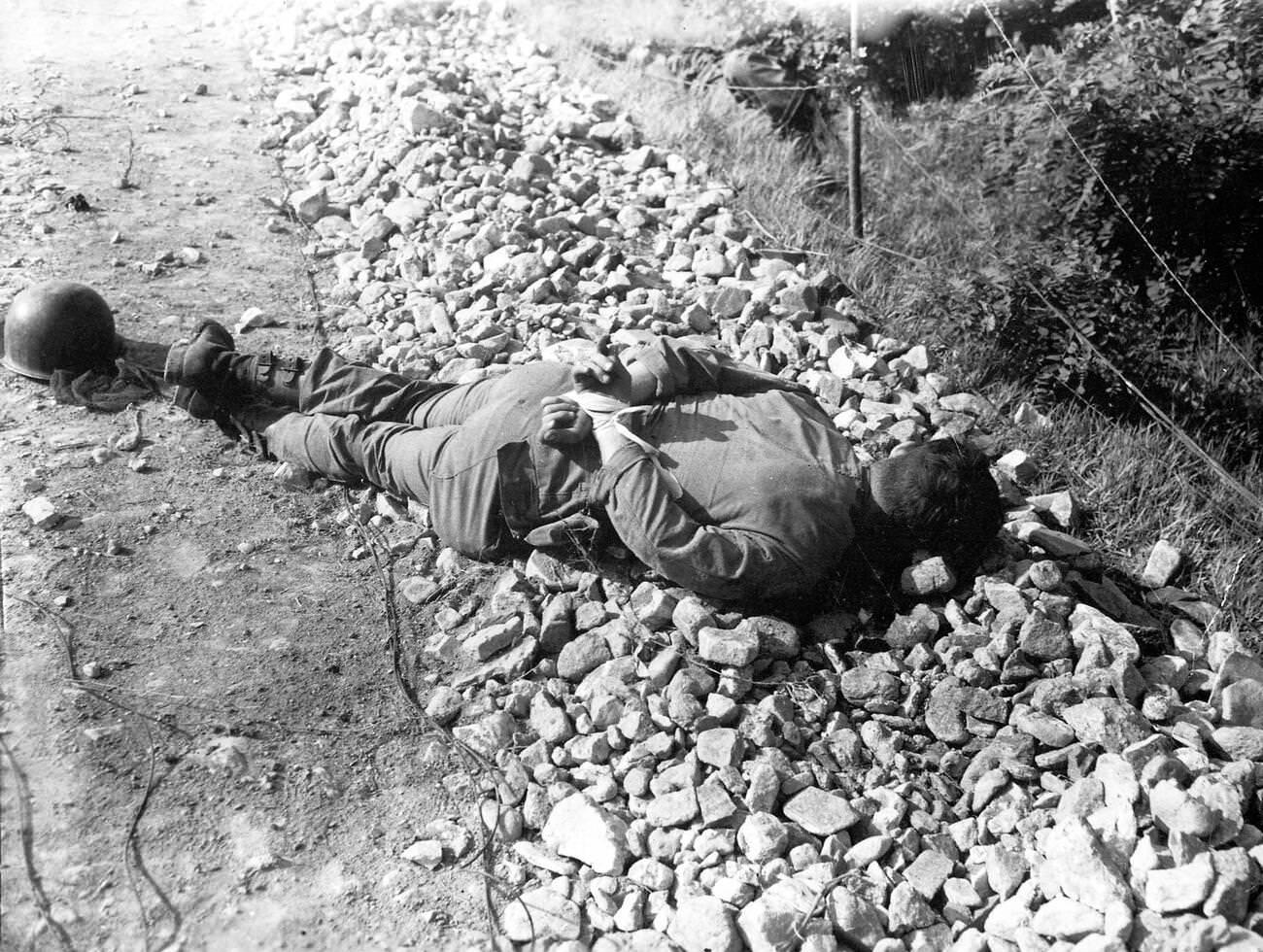 Korean War, Executed South Korean soldier with hands tied behind his back, 1950s.