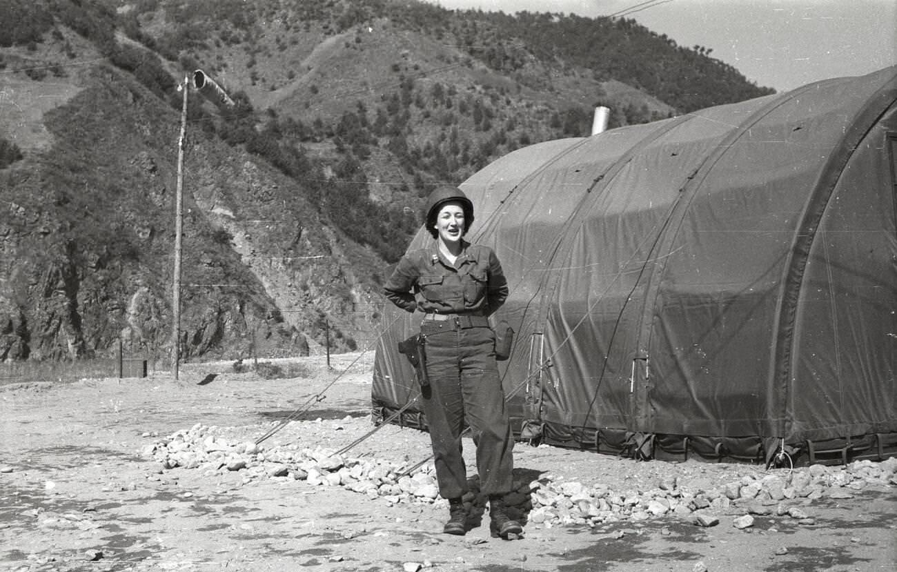 A woman with the rank of captain outside a tent, Mobile Army Surgical Hospital (MASH), 1950s.