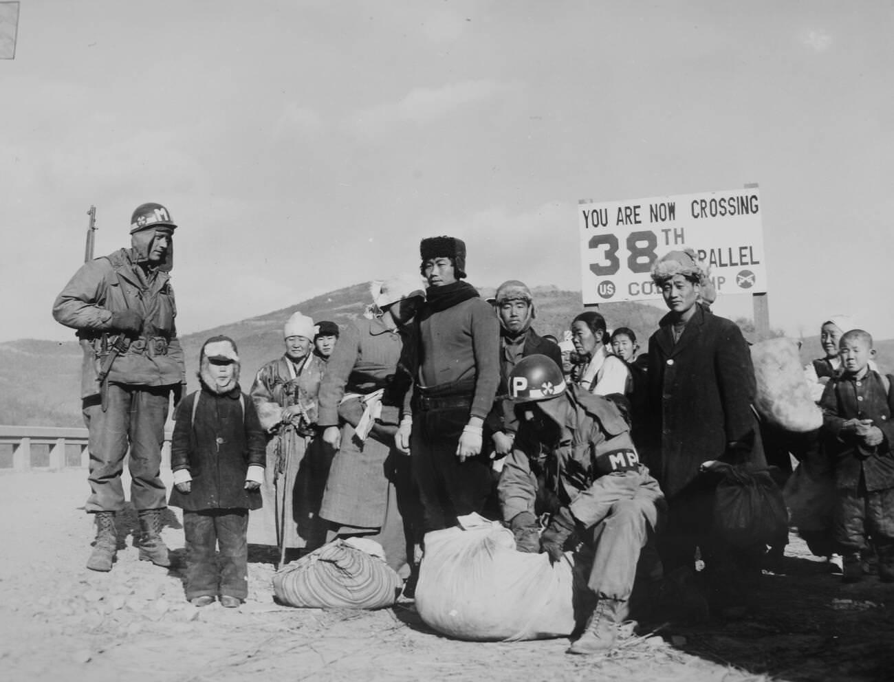 Refugees checked at the 38th Parallel for contraband, 1950s.