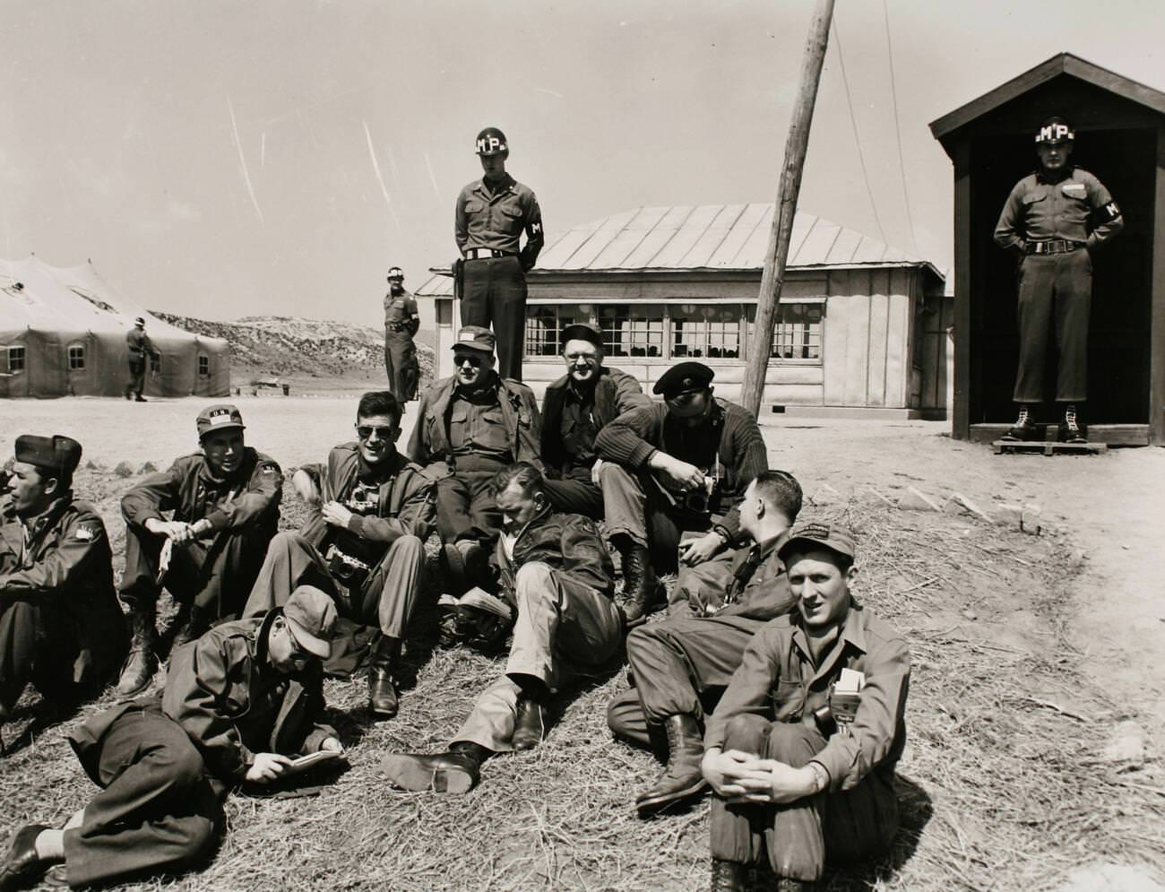 Prisoner of War discussions at Panmunjon, Korea. United Nations correspondents wait for another session, 1953.