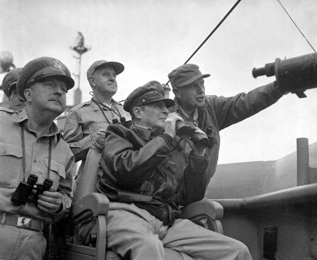 General Douglas MacArthur observes the naval shelling of Incheon, 1950.