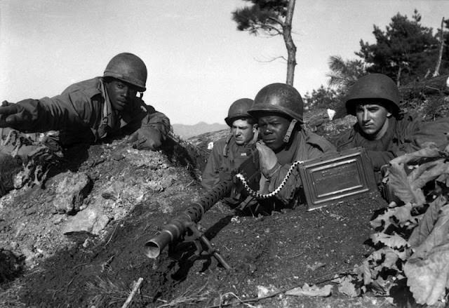 Soldiers from the U.S. 2nd Infantry Division in action near the Ch'ongch'on River, 1950.