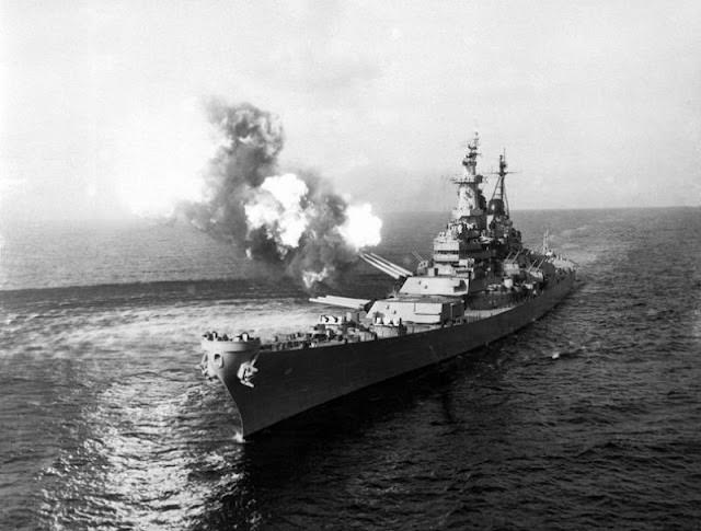 To disrupt North Korean communications, the USS Missouri fires a salvo, 1950.