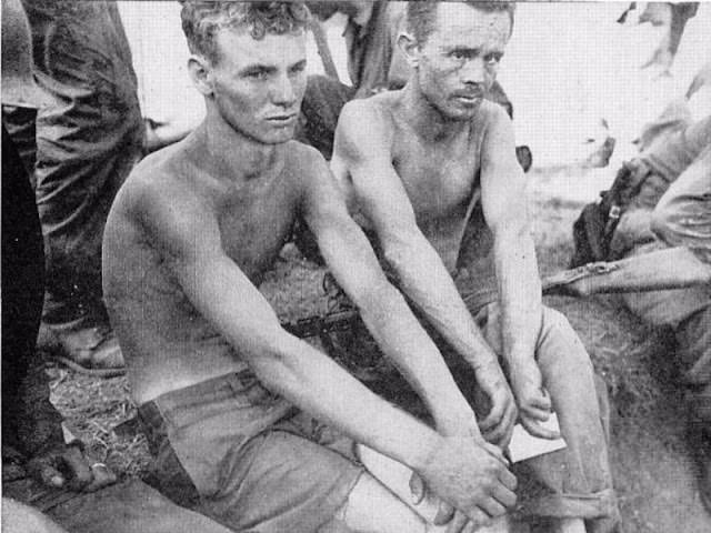 Two Hill 303 survivors after being rescued by American units, 1950.