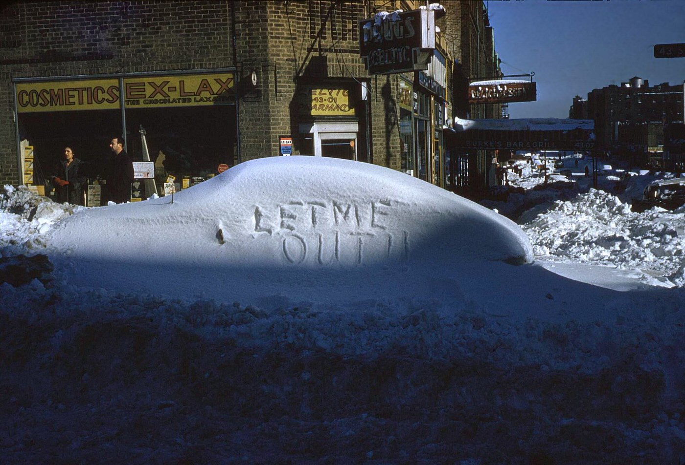 Queens NY Drug store and snow covered car, 1961