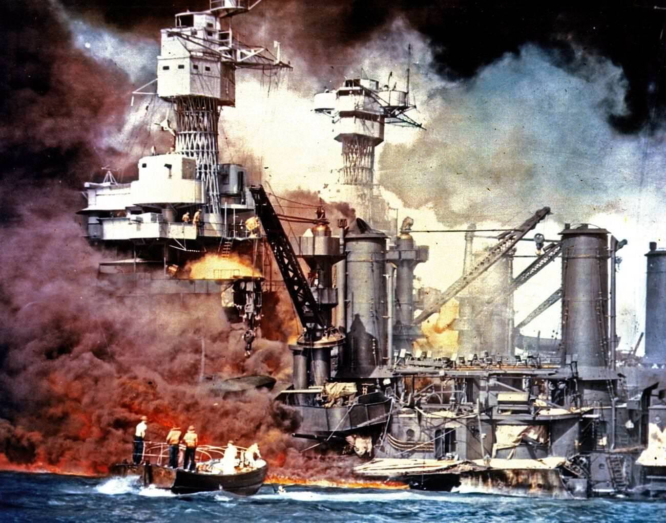 Smoke rolls out of a burning ship during the Japanese attack on Pearl Harbor, 1941.