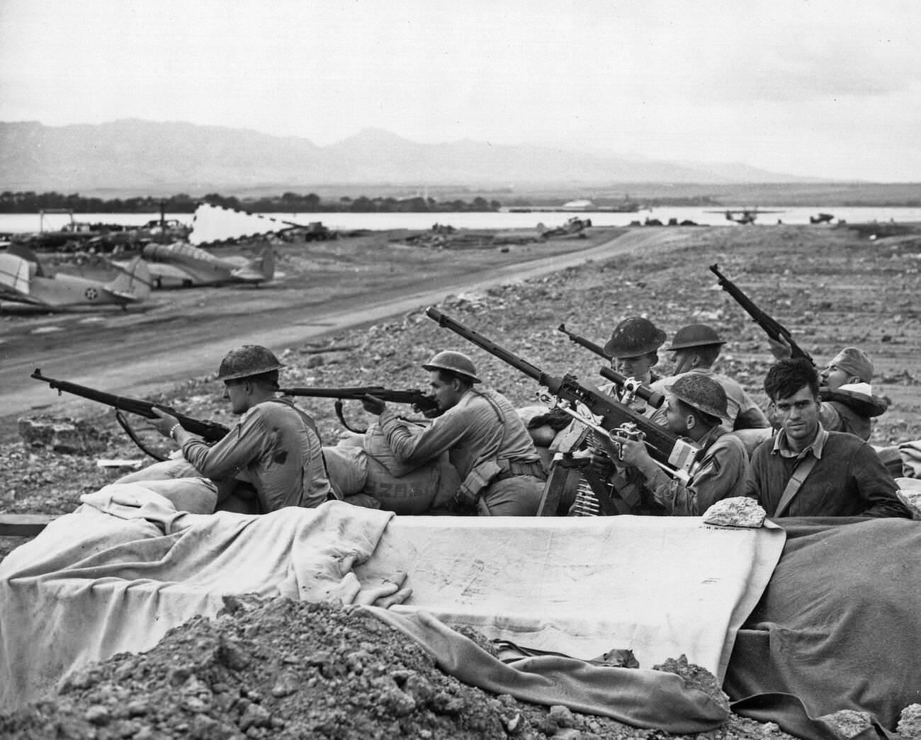 Gun crews during the Japanese attack on Pearl Harbor, 1941. Marines and soldiers fire on raiding Japanese planes.