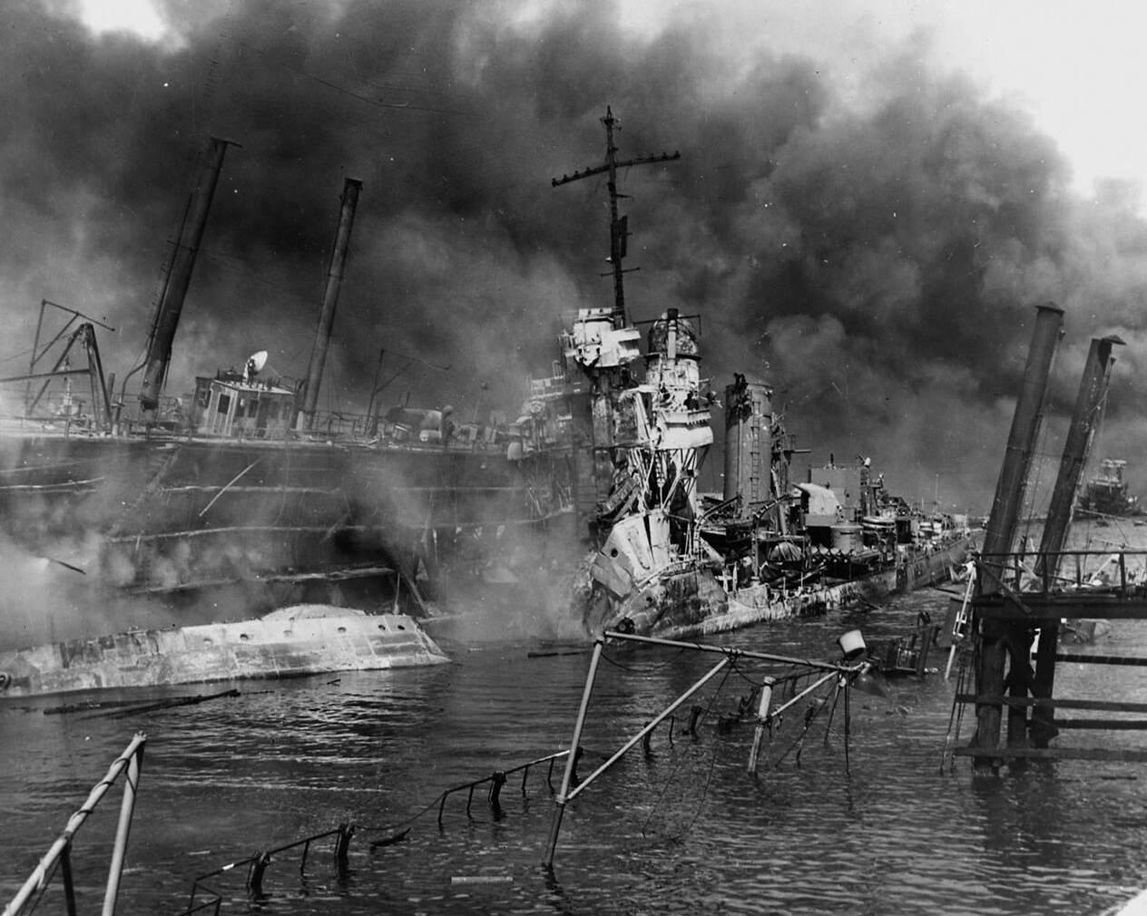 A naval photograph documenting the Japanese attack on Pearl Harbor, Hawaii which initiated US participation in World War II, 1941.