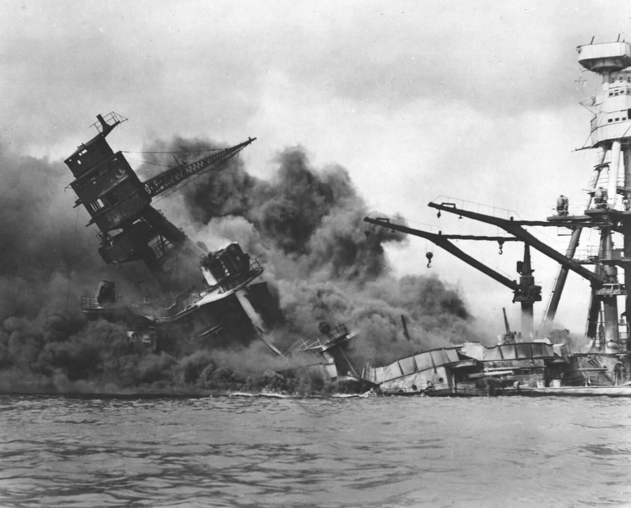 The USS Arizona battleship sinking during the attack on Pearl Harbor, 1941.