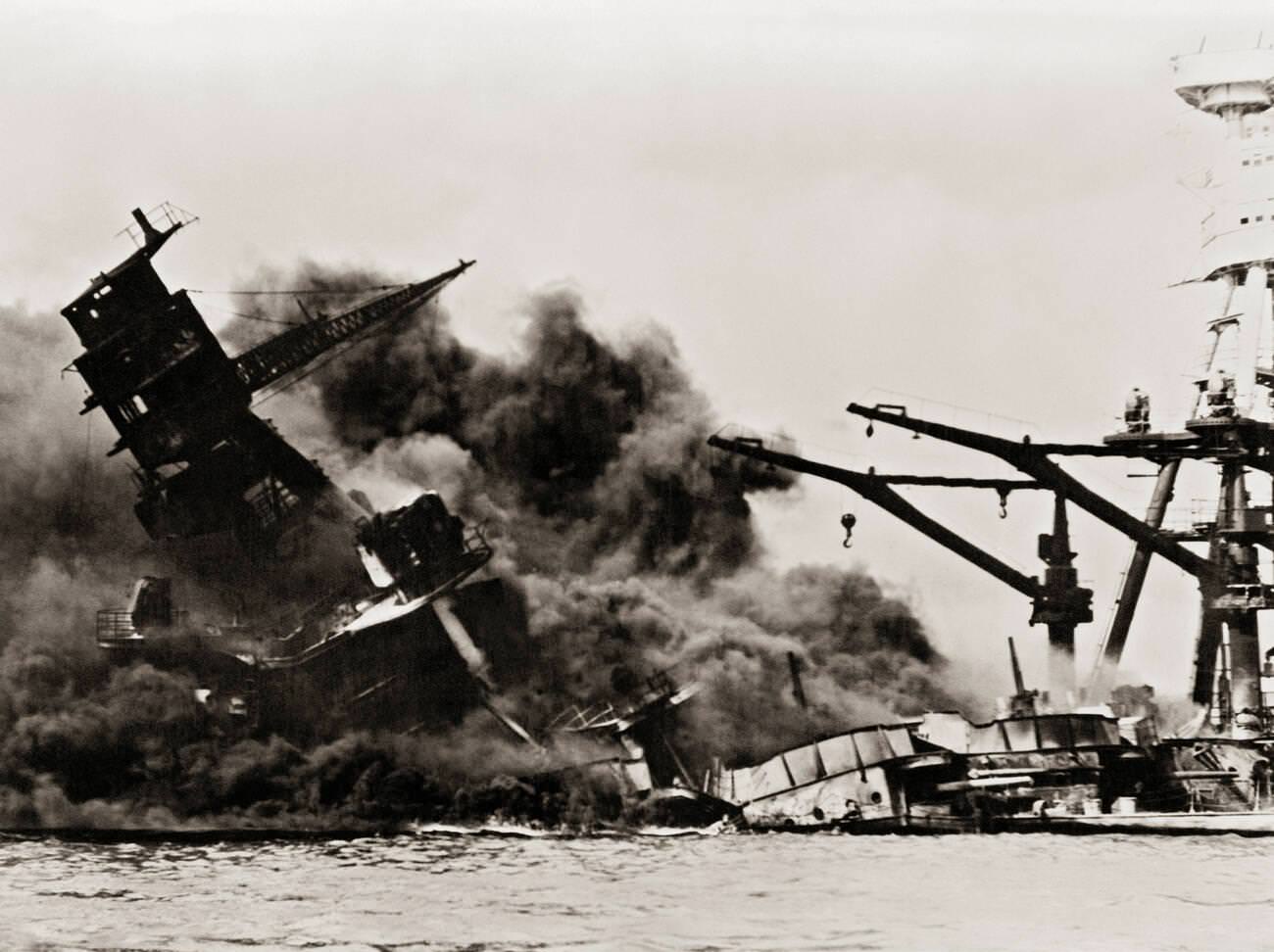 Ships burning and sinking after the attack on Pearl Harbor, 1941.