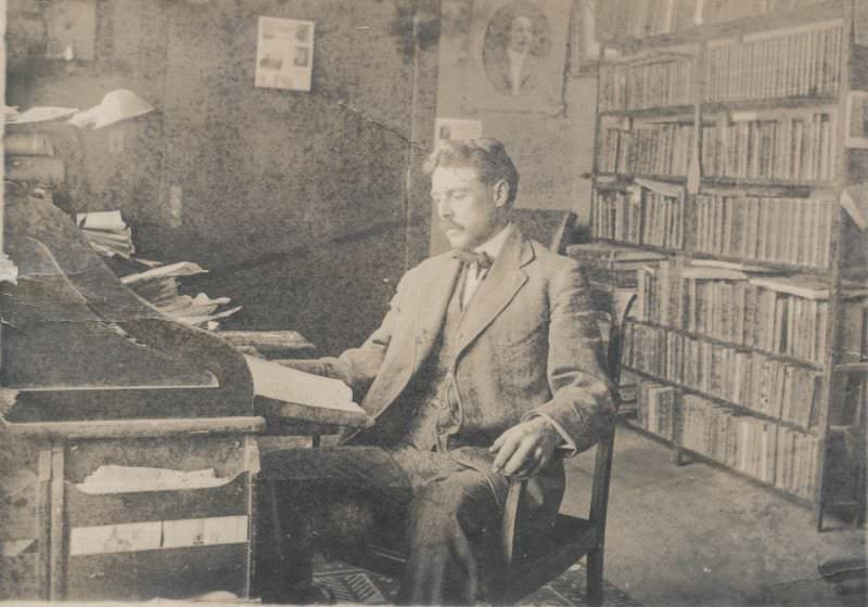 Man sits in his library