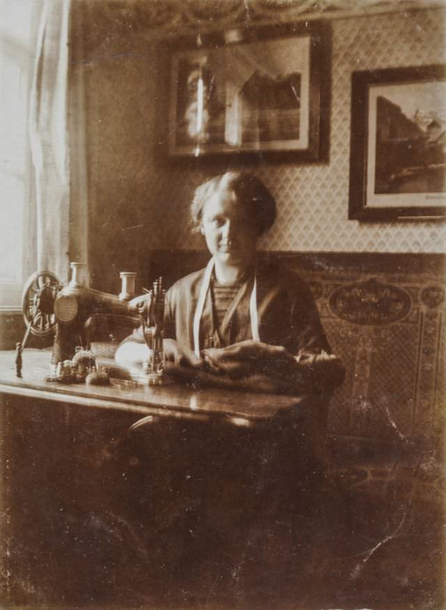 Woman working on her sewing machine