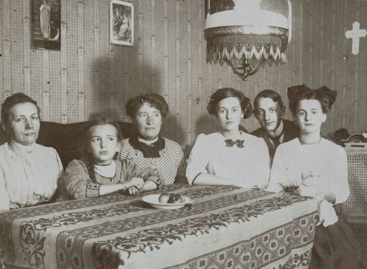 Family gathered around a dining room table