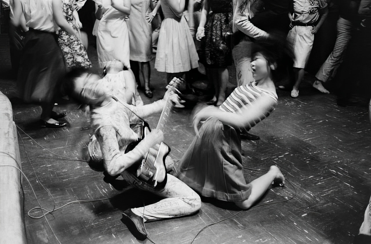 A fan and a "Tokyo Beatle", 1964.