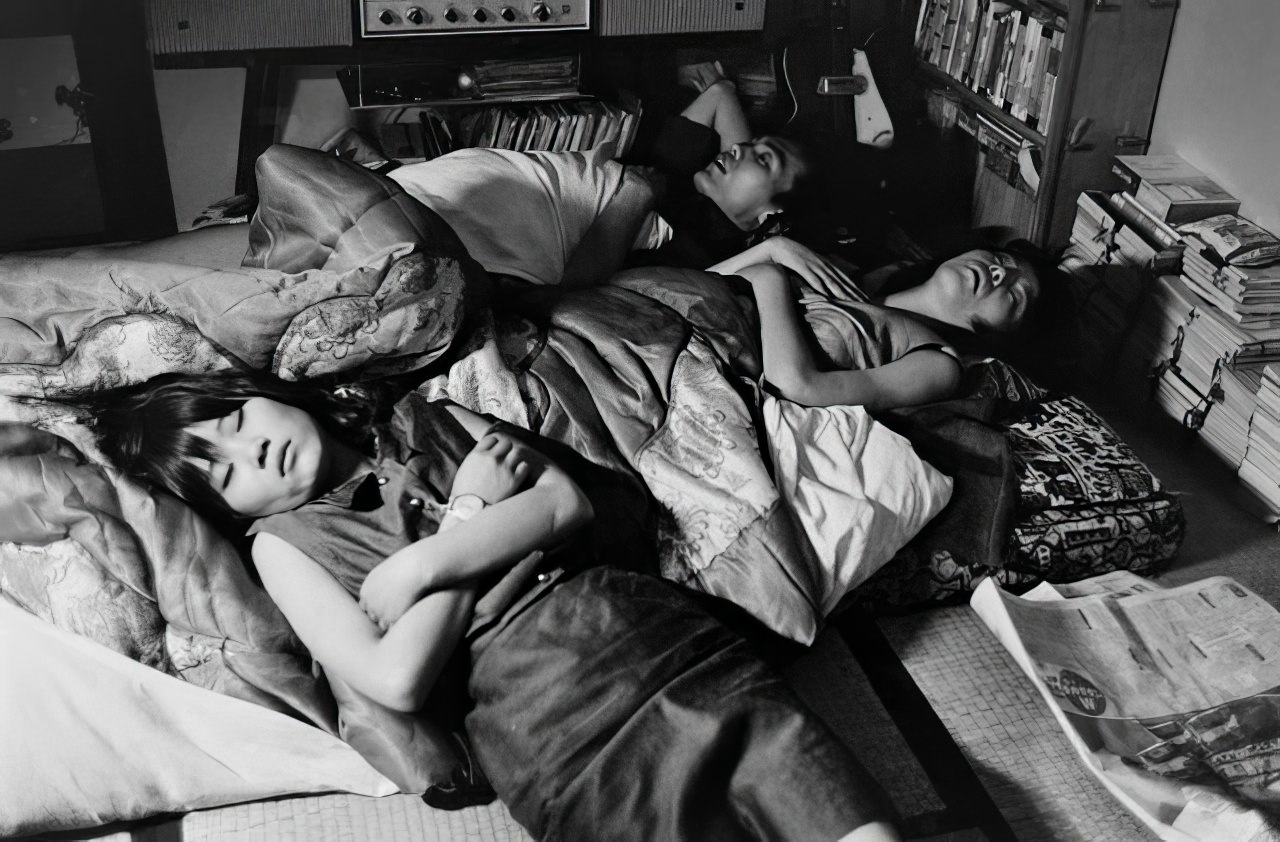 Yoko often ends her long nights sprawled on a futon in a friend's room, 1964.