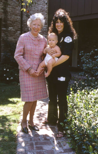 Grace steps outside with her mom and little China in 1971.