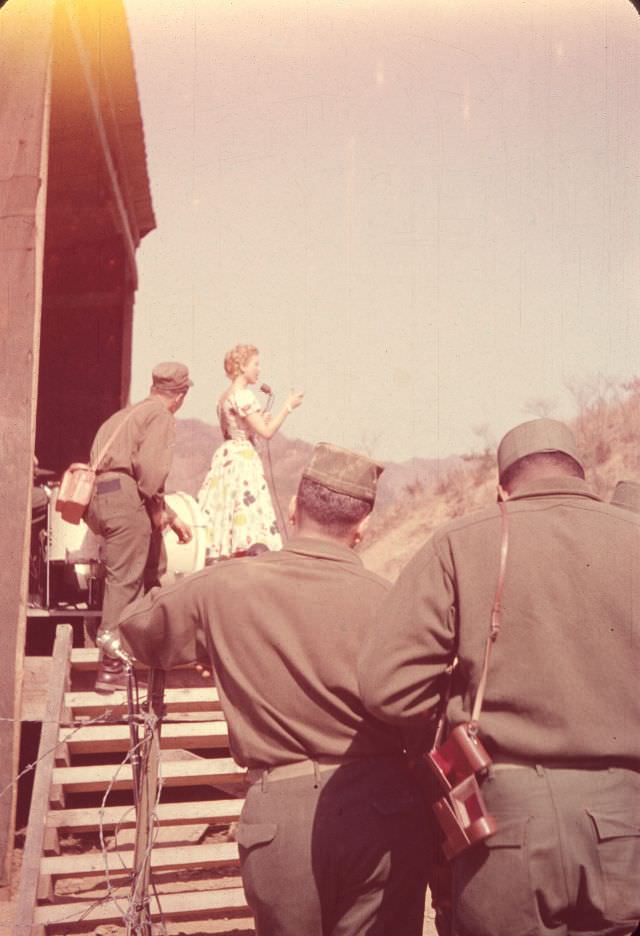 U.S. soldiers at 'Slapsie Maxie' show, Korea, April 1954