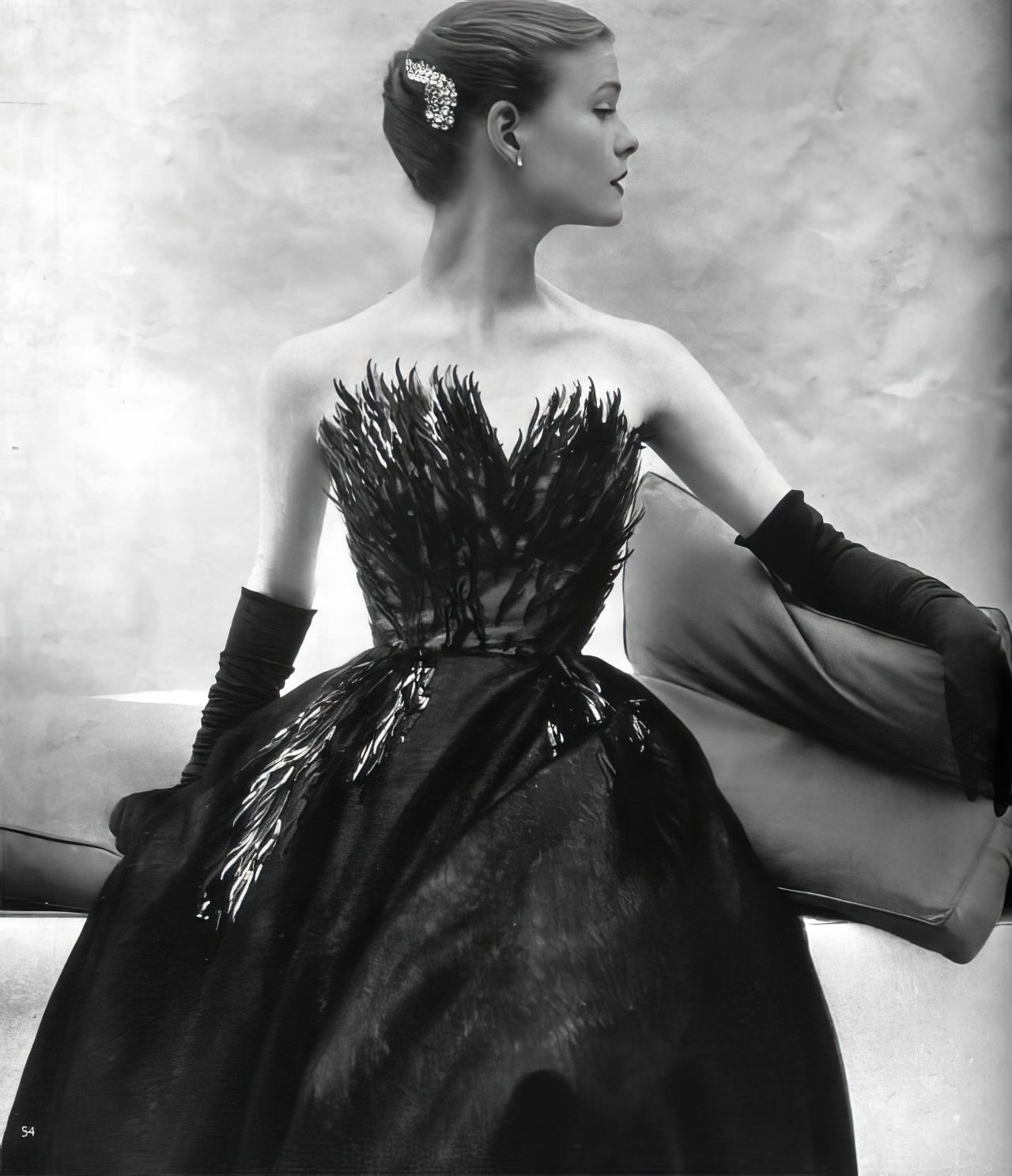 Susan Abraham in an elaborately pailletted evening gown, 1952.
