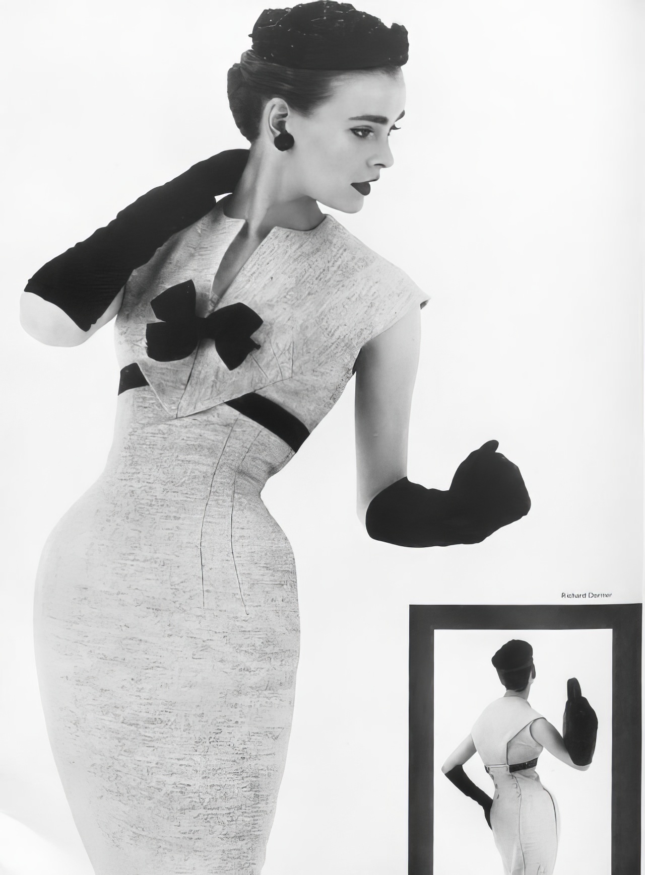 Susan Abraham in an off-white tweed dress, 1953.