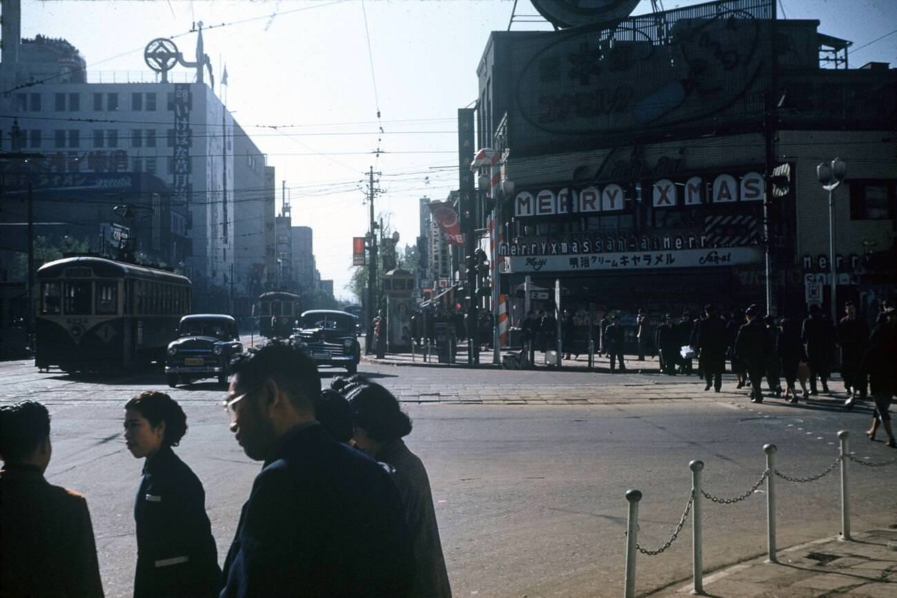 Streetcars and cars on the Ginza 4-chome intersection, 1953.