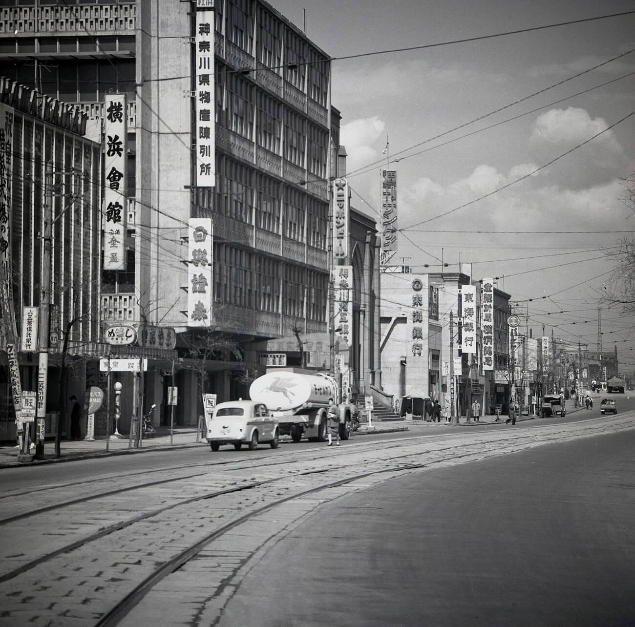 Tram-lines in the road in the old town area of Tokyo, 1950s.