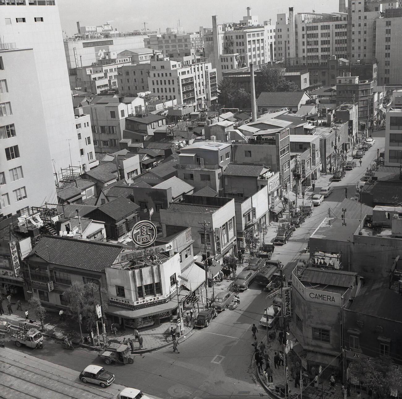 An aerial photo showing the low-rise 'old town' in Tokyo, 1950s.