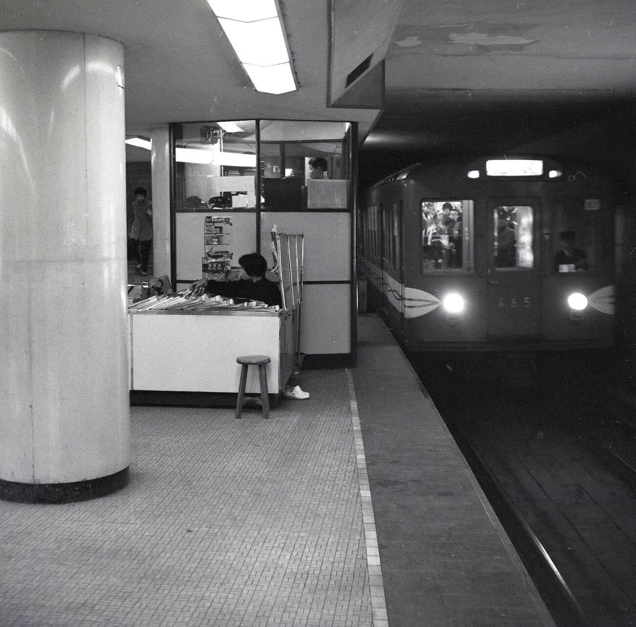A Tokyo metro train pulling into a station, 1950s.