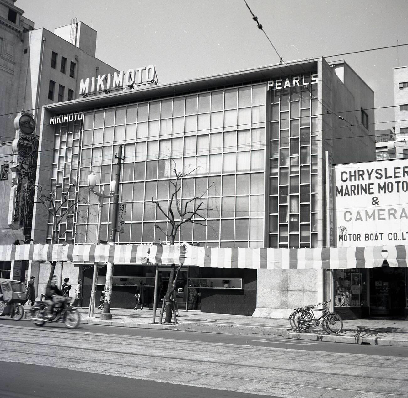 The exterior of the Japanese luxury pearl company, Mikimoto, 1950s.