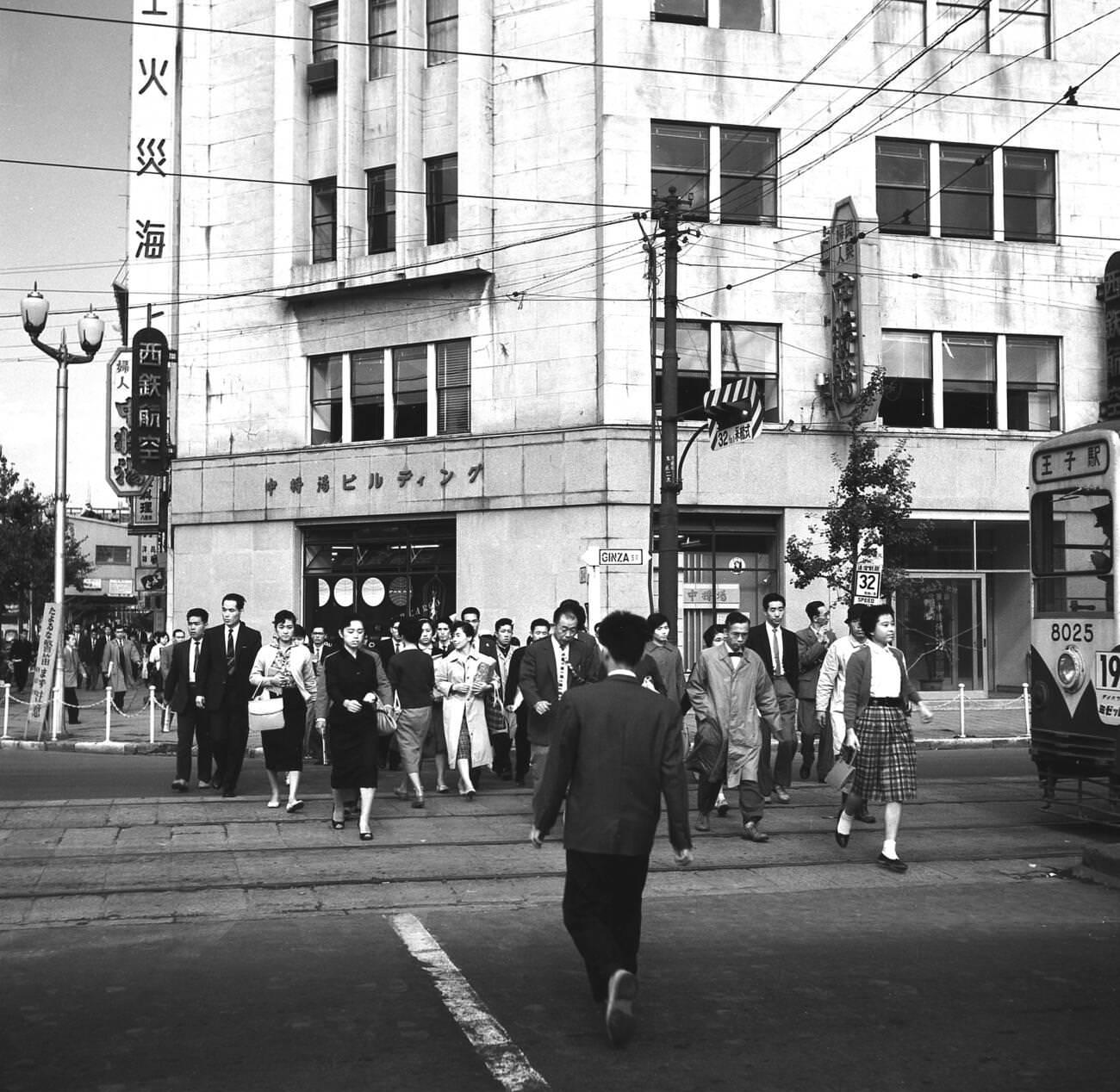 People crossing Ginza Street, Tokyo, 1950s.