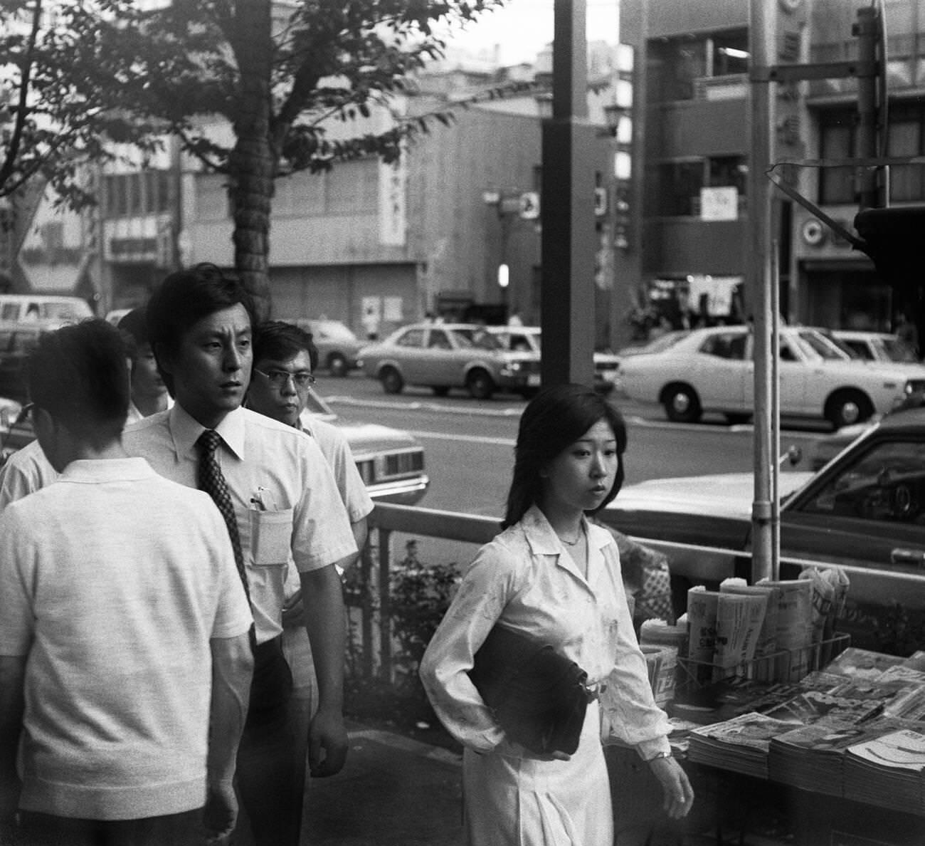 People walk down the street, Tokyo, 1978.