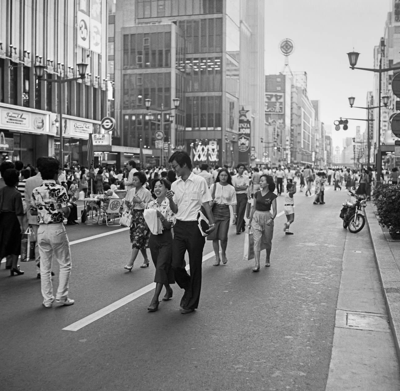 People walk down the street, Tokyo, 1978.