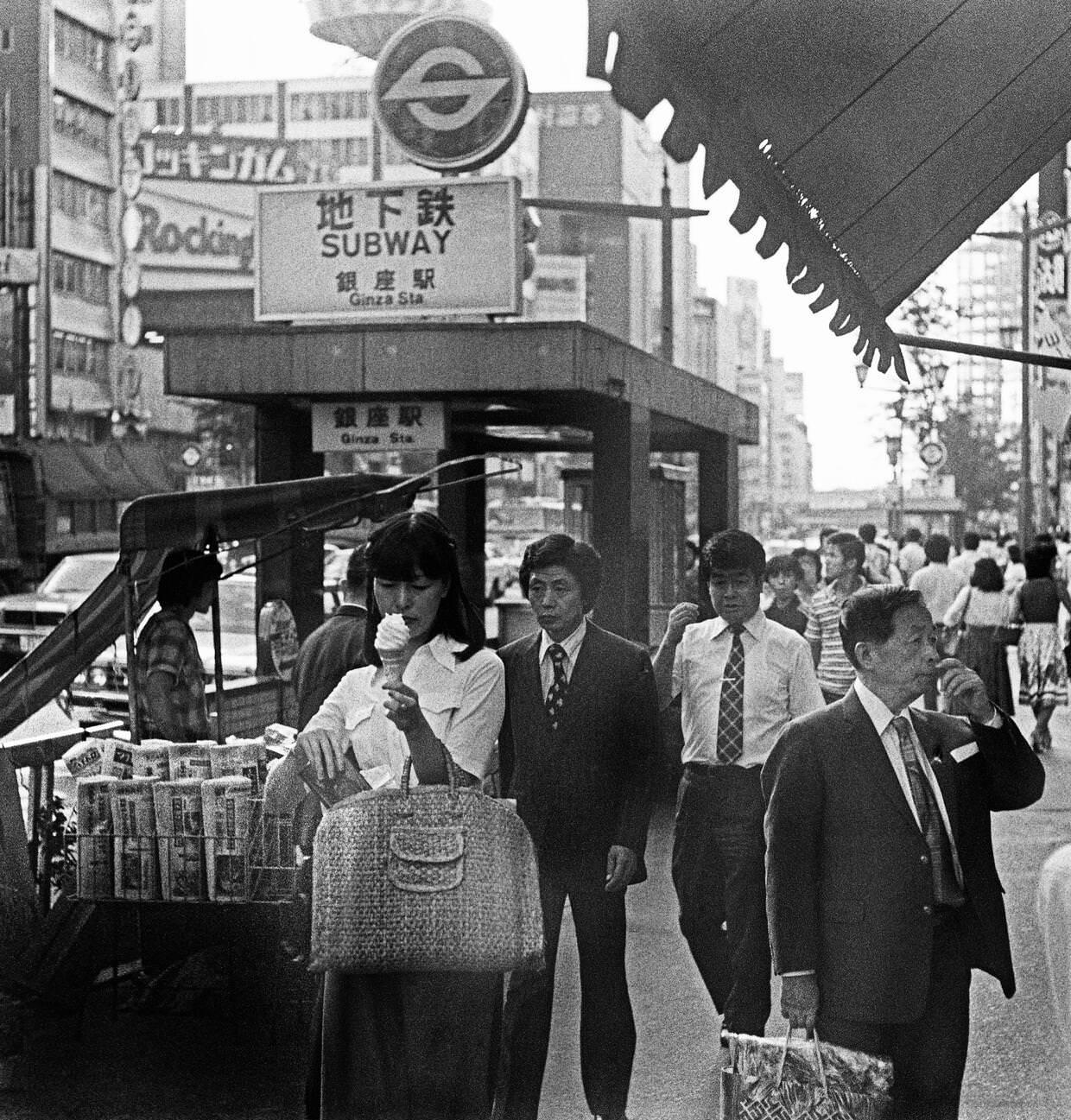 People walk down the street, Tokyo, 1978.