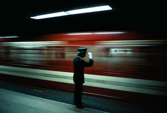 Platform conductor, Ikebukuro, 1976